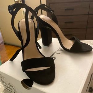 Black sexy heels from Aldo. Size 6.5 worn once.